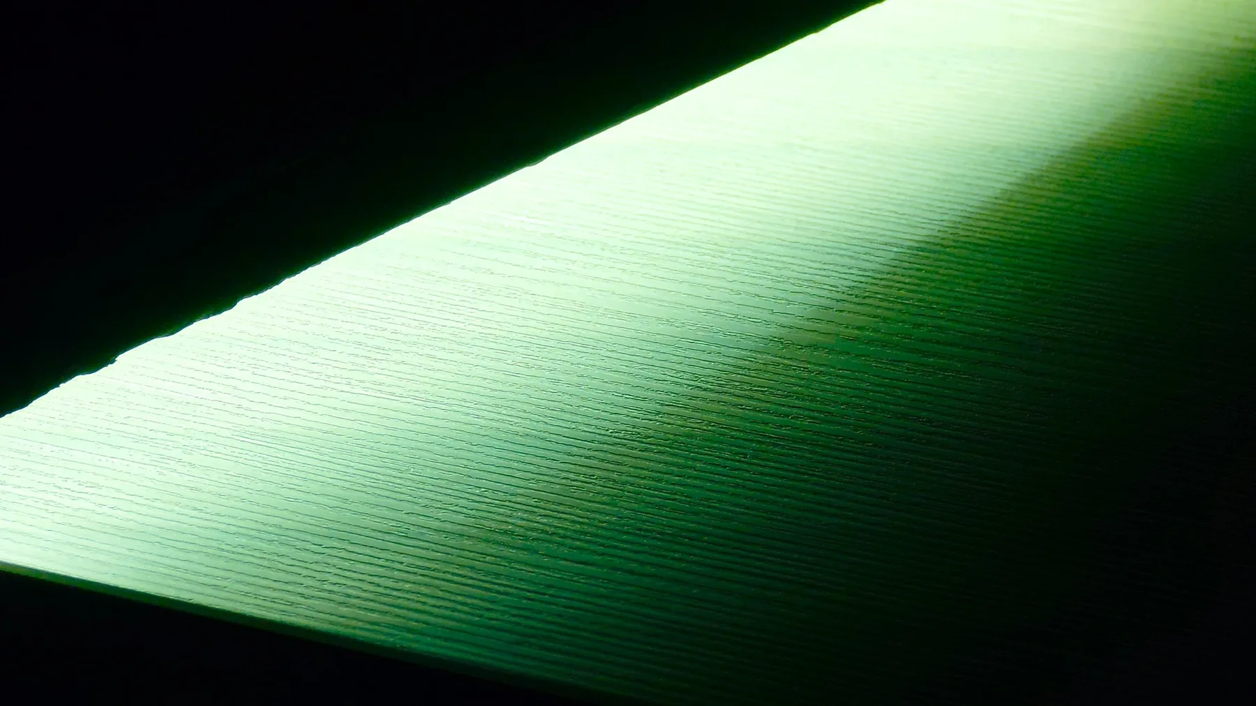 Close-up of a woodgrain edgebanding profile