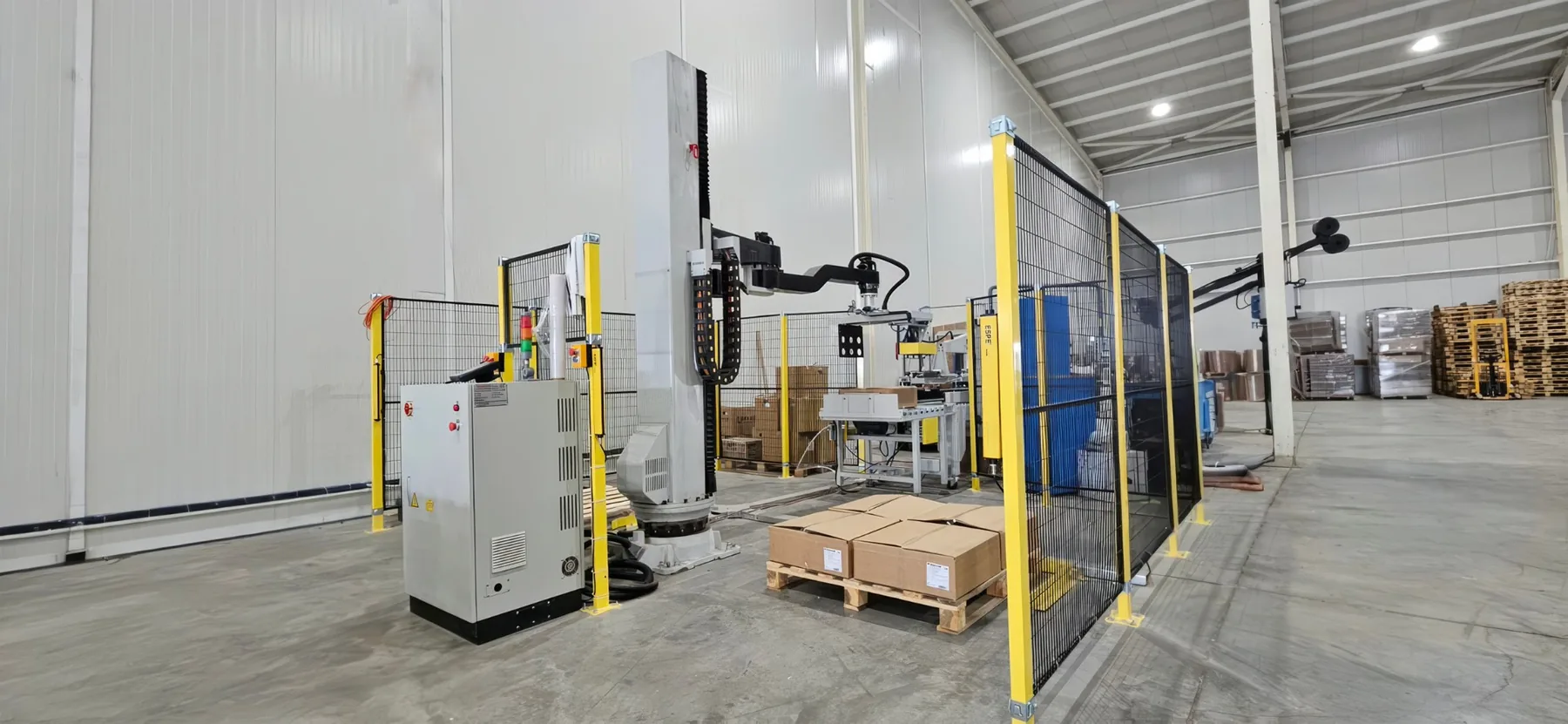 Robotic packaging arm in the automated warehouse at Tece Dekor Bulgaria's Burgas facility